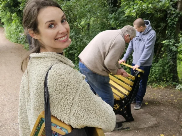 Jade Dawn with two Ware Men’s Shed volunteers installing a gold River Lea Art Trail bench beside the towpath.